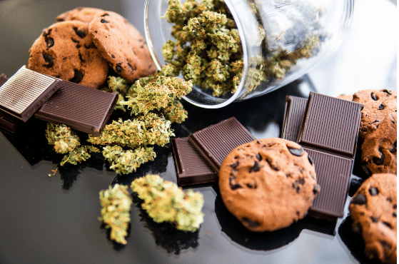 Cannabis and edibles laid out on the table