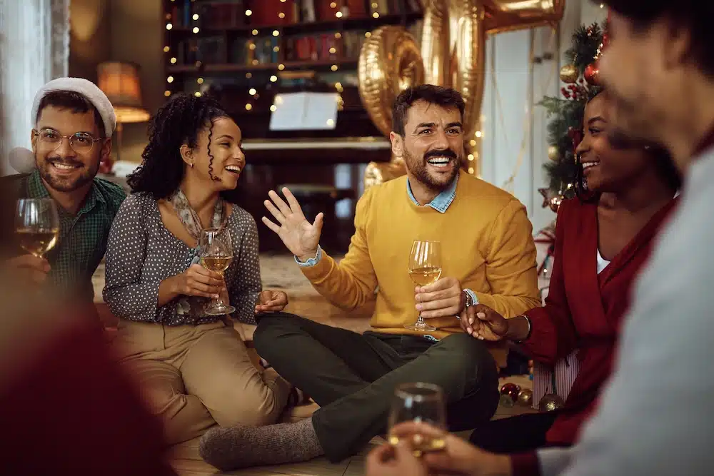 A happy group of friends celebrating the holidays together